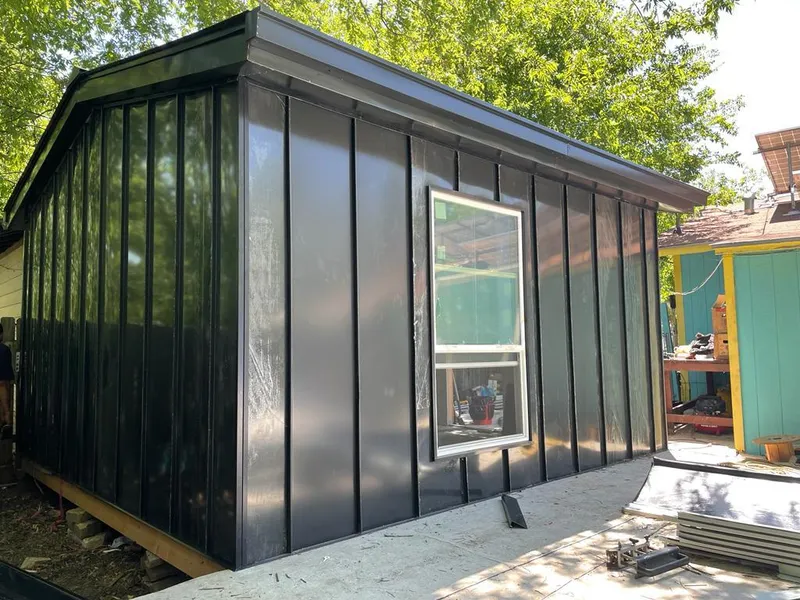 Black standing seam metal wall panels for Metal Roof Installation in Central Falls