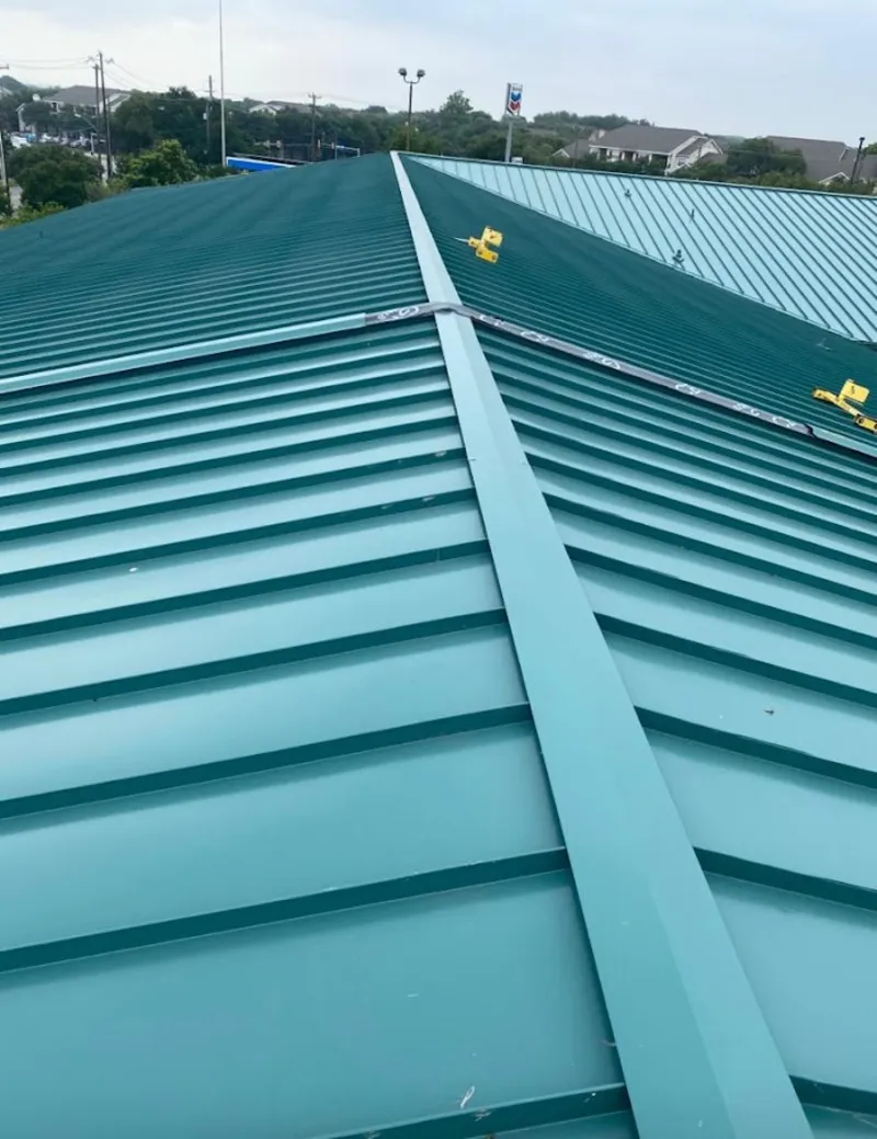 Green commercial metal roof ridge and valley for Metal Roof Repair in Central Falls