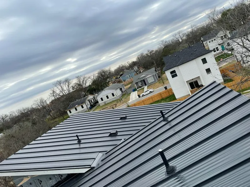 Standing seam metal roof panels with vents for Skylight Repair in Central Falls